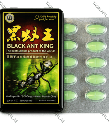Black Ant King Power Tablet tin box and green tablet blister pack on white background